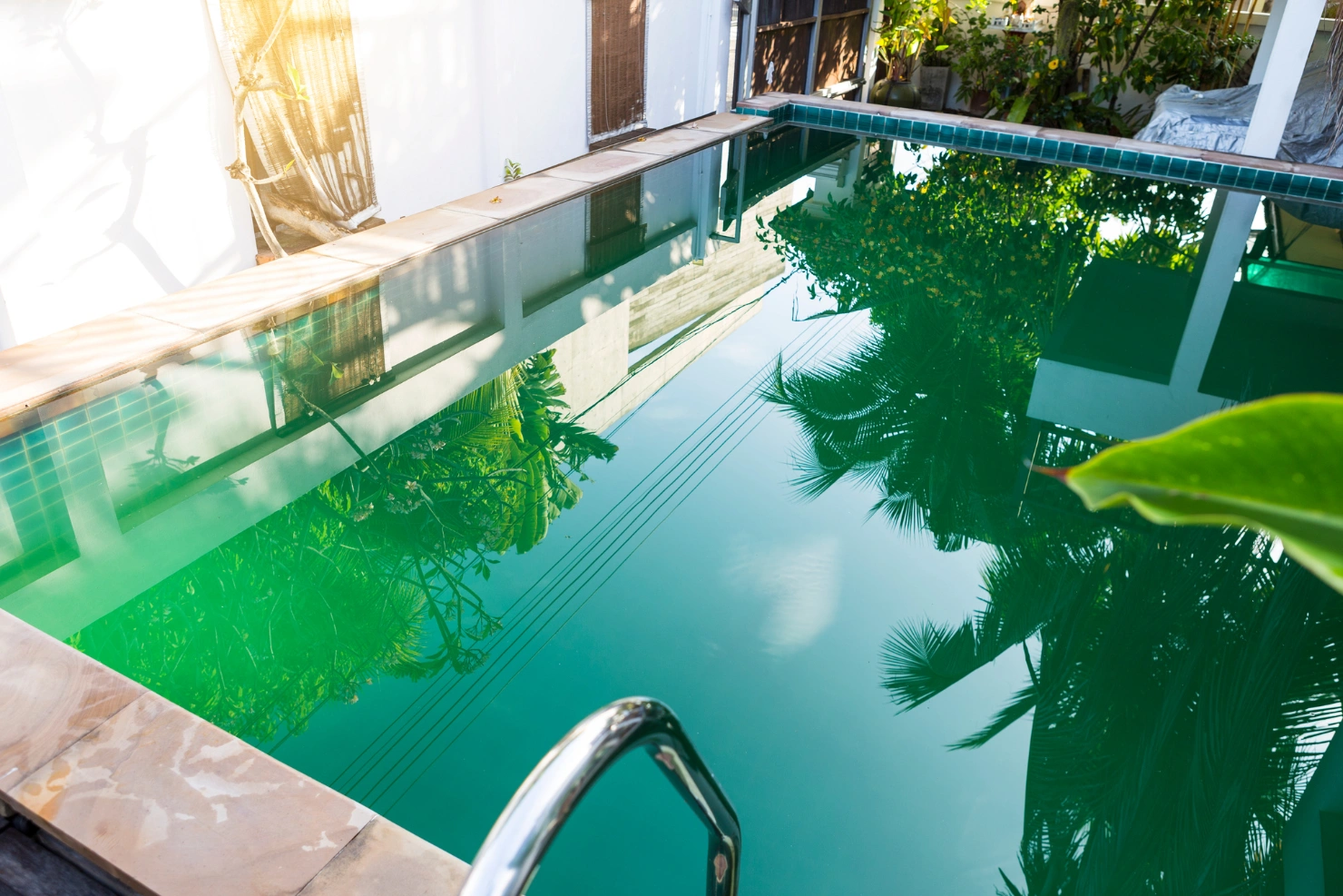 Why Green Pool Water Keeps Coming Back After Chemical Treatment
